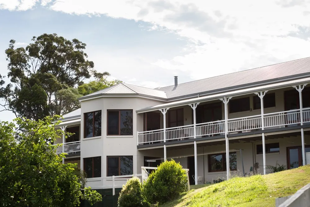 Guardian fall safe screens on outside of big white house